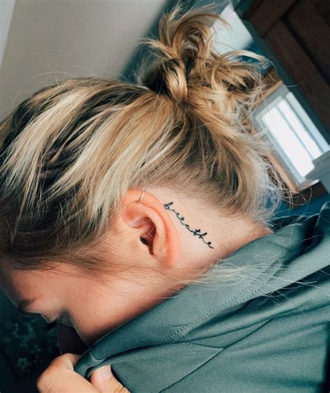 tattoos behind the ear meaning